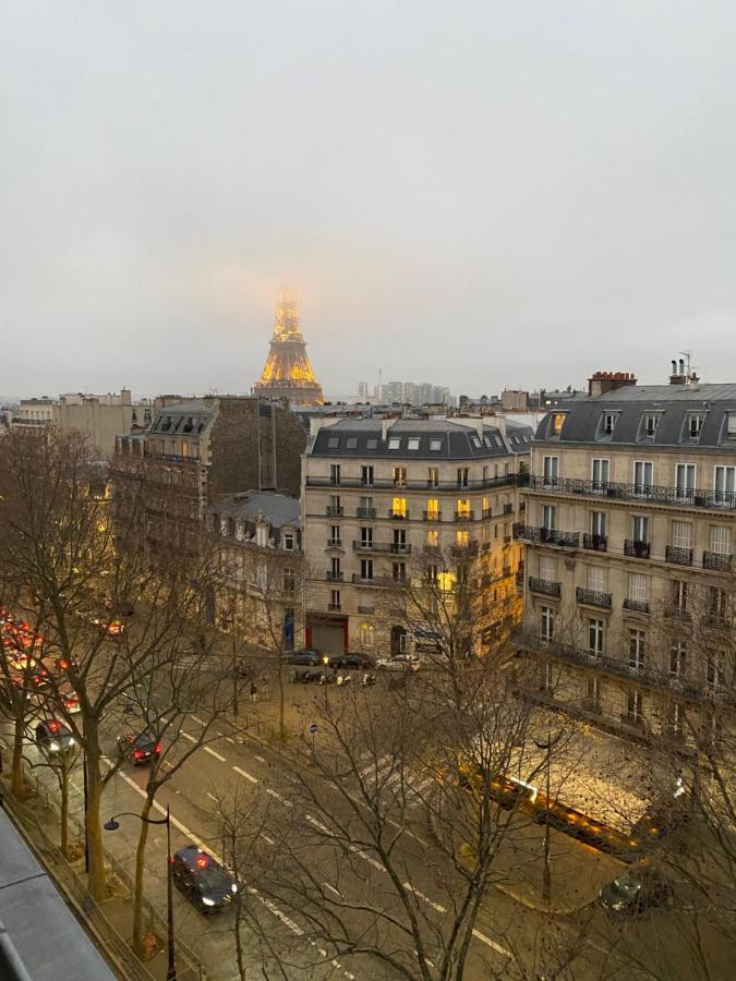 The Eiffel Tower Room Parigi Esterno foto